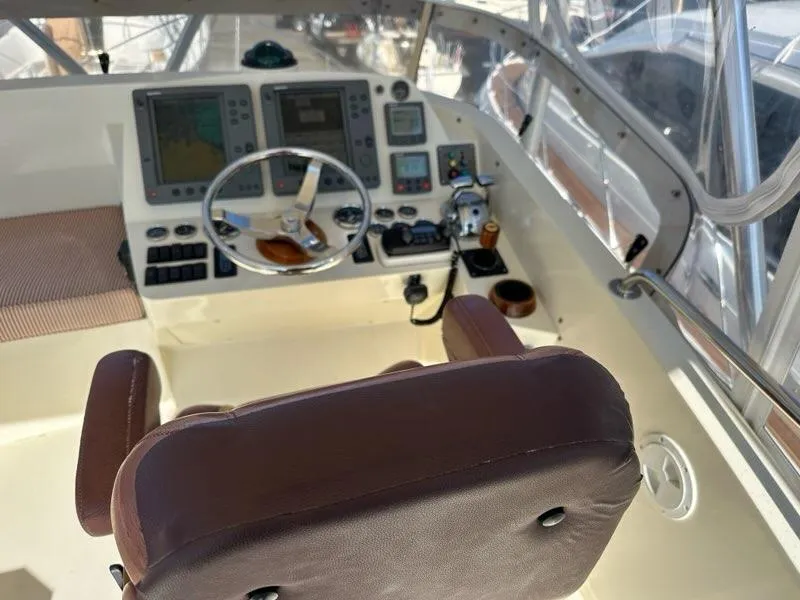 Slide: The Image of Helm of 2003 Hinckley Talaria 44 FB with navigation equipment and leather seat. - 42