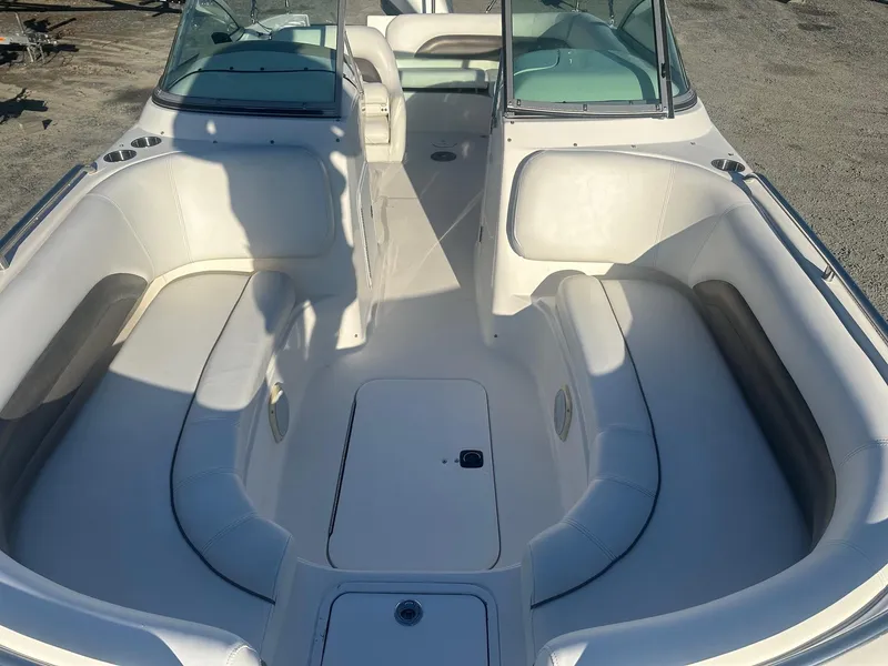 Slide: The Image of 2012 Godfrey Hurricane 237 boat interior with spacious seating and storage compartments. - 10