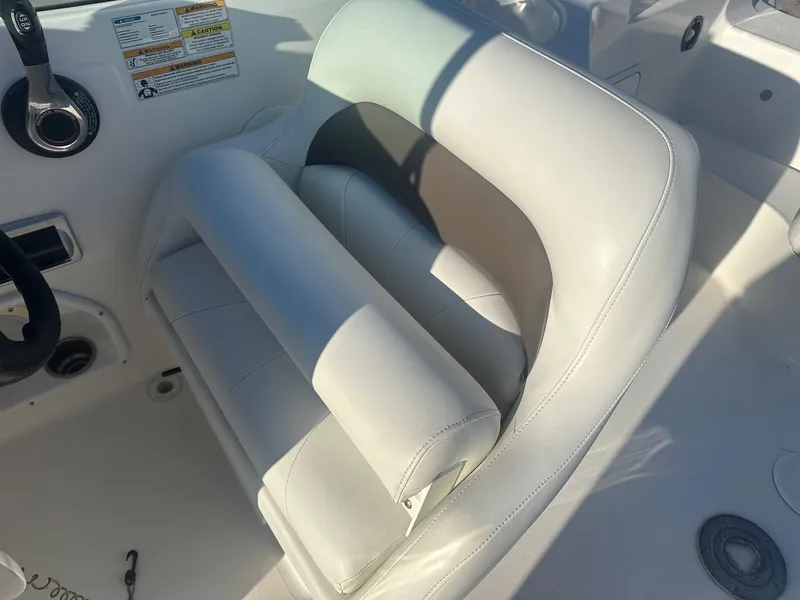 Slide: The Image of White leather seat on 2012 Godfrey Hurricane 237 boat. - 7