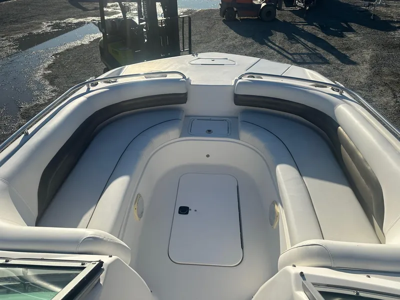 Slide: The Image of 2012 Godfrey Hurricane 237 boat interior with spacious seating and storage. - 9