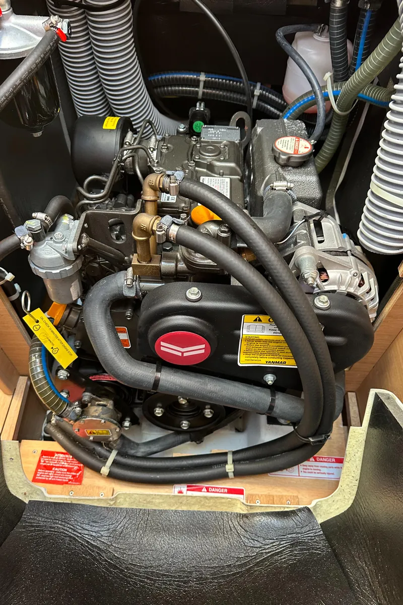 Slide: The Image of Engine compartment of 2022 Jeanneau Sun Odyssey 349 sailboat. - 19