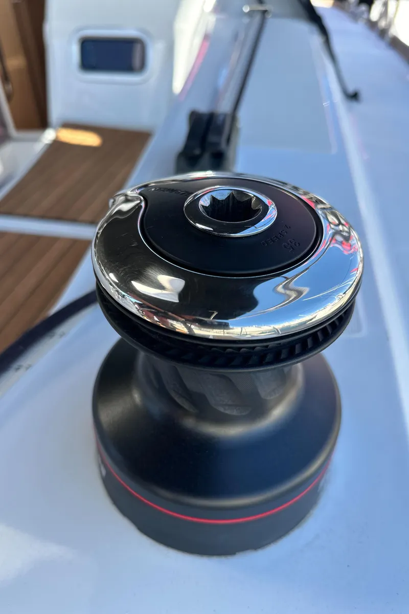 Slide: The Image of Close-up of a winch on a 2022 Jeanneau Sun Odyssey 349 sailboat. - 20