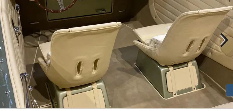 Slide: The Image of Interior of 2022 Seven Seas Yachts Speedster with beige leather seats and elegant design. - 5