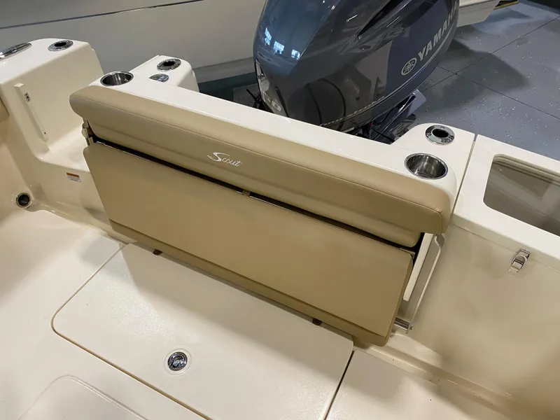 Slide: The Image of 2024 Scout 215 XSF boat with Yamaha engine and foldable seating. - 11
