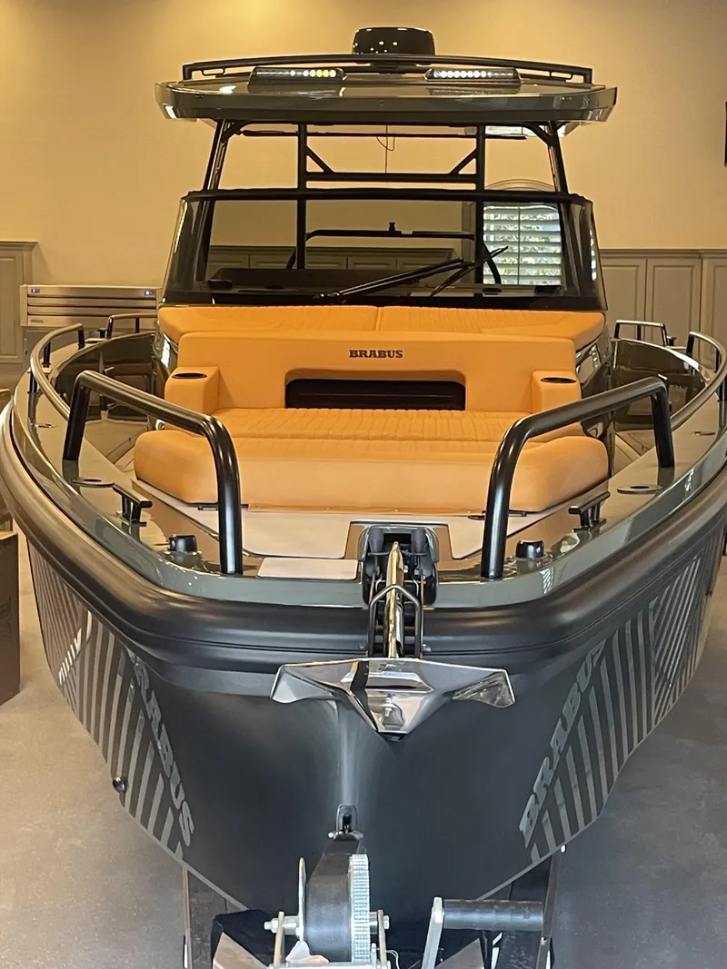 Slide: The Image of 2023 BRABUS Shadow 900 Stealth Green boat with sleek design and luxurious seating. - 8