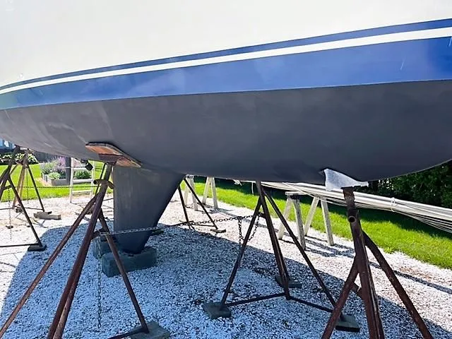 Slide: The Image of 1979 O'Day 28 sailboat on stands, hull view, outdoors. - 8