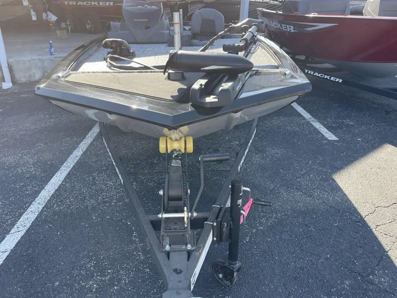 Slide: The Image of 2025 Tracker Pro 170 boat on trailer in parking lot. - 10