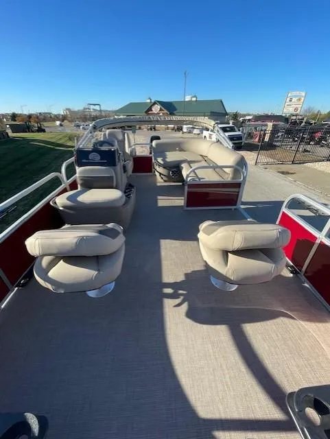 Slide: The Image of 2025 Sun Tracker Bass Buggy 16 XL Select pontoon boat with spacious seating. - 2