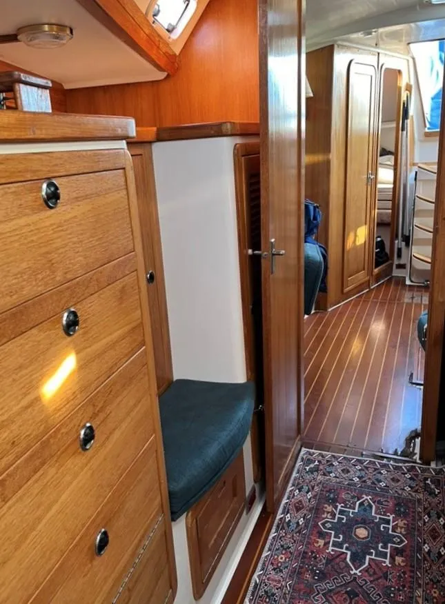 Slide: The Image of Cozy cabin interior of a 1998 Catalina 42 Mk II sailboat with wooden cabinetry. - 21