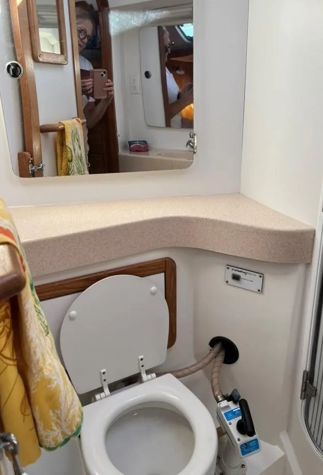 Slide: The Image of 1998 Catalina 42 Mk II yacht bathroom with shower and sink. - 24