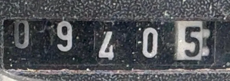 Slide: The Image of Engine of a 1998 Catalina 42 Mk II sailboat, showcasing mechanical components and belts. - 34