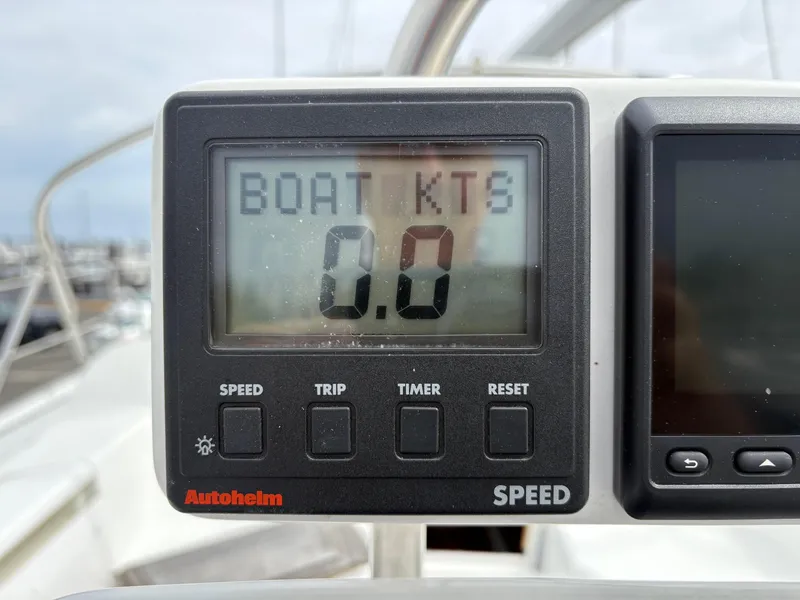 Slide: The Image of Garmin GPS display on Catalina 42 Mk II, showing navigation and speed data. - 5