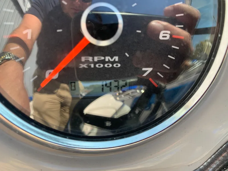 Slide: The Image of Close-up of 2018 Chaparral 21 H2O Sport tachometer showing 147.2 hours. - 7