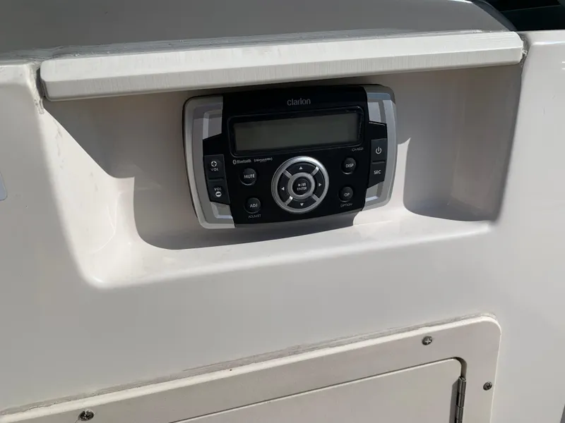 Slide: The Image of 2018 Chaparral 21 H2O Sport boat stereo system close-up. - 9
