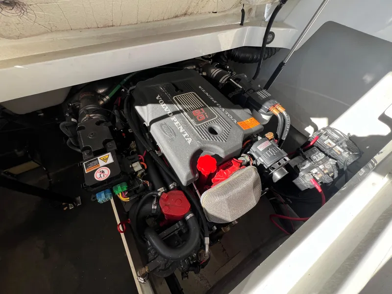 Slide: The Image of Engine compartment of a 2002 Cobalt 262 boat, featuring a Volvo Penta engine. - 40