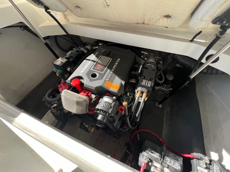 Slide: The Image of 2002 Cobalt 262 boat engine compartment with visible Volvo Penta engine components. - 41