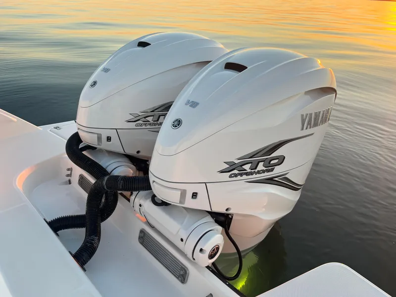 Slide: The Image of Edgewater 340CC 2022 with twin Yamaha XTO outboard engines at sunset. - 39