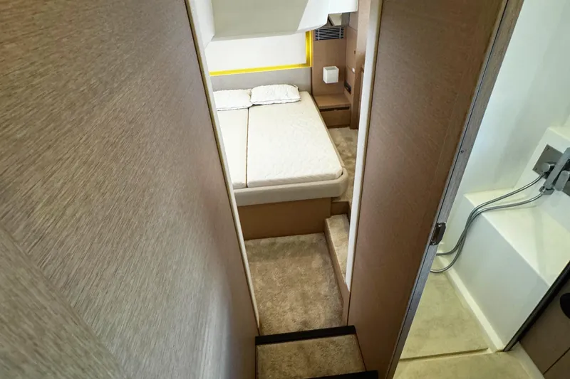 Slide: The Image of Interior of 2019 Prestige 460 Fly Bridge yacht bedroom with modern design. - 27