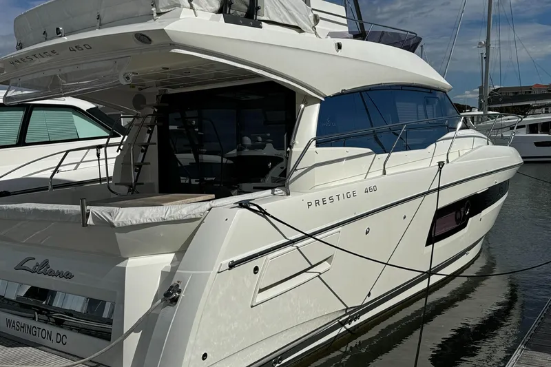 Slide: The Image of 2019 Prestige 460 Fly Bridge yacht docked in marina, Washington DC. - 3
