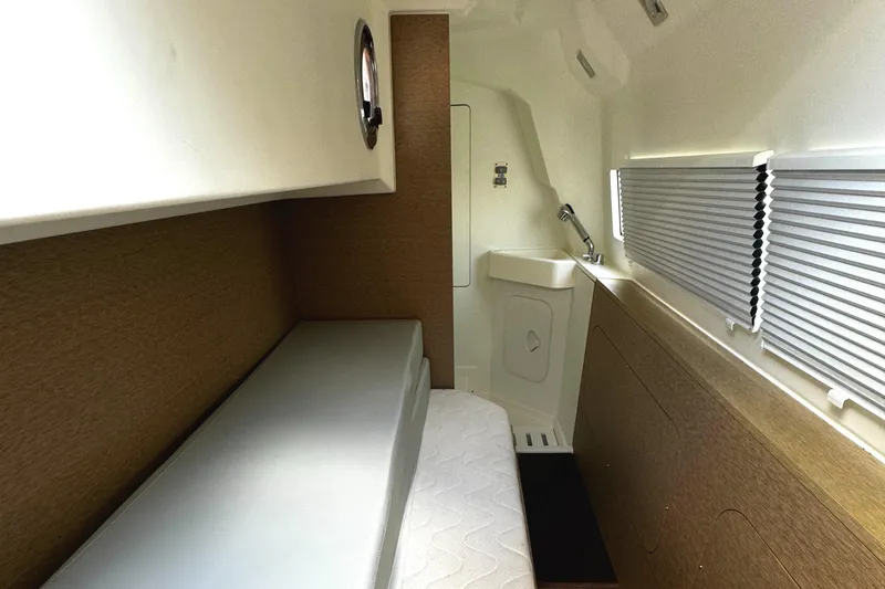Slide: The Image of Interior cabin of 2019 Prestige 460 Fly Bridge yacht with bed and sink. - 48