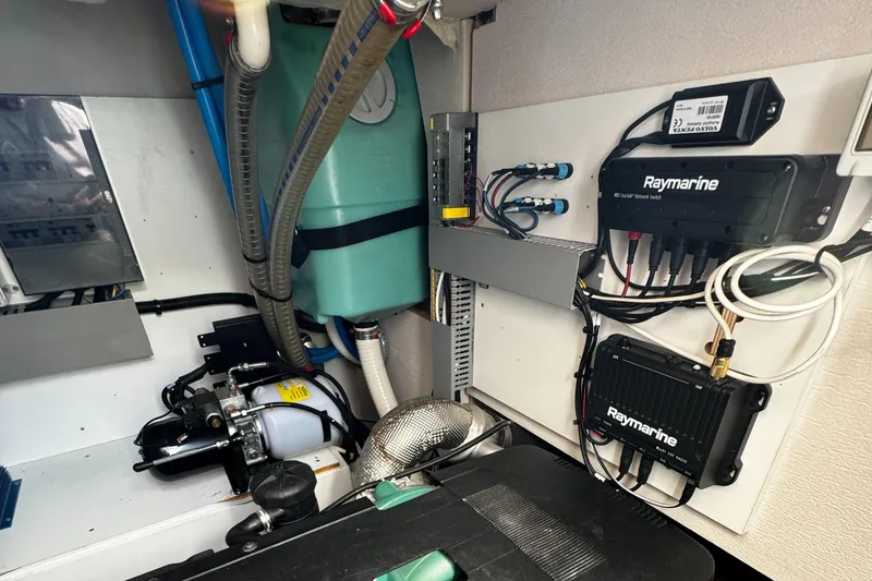 Slide: The Image of Engine room of 2019 Prestige 460 Fly Bridge with Raymarine electronics. - 49