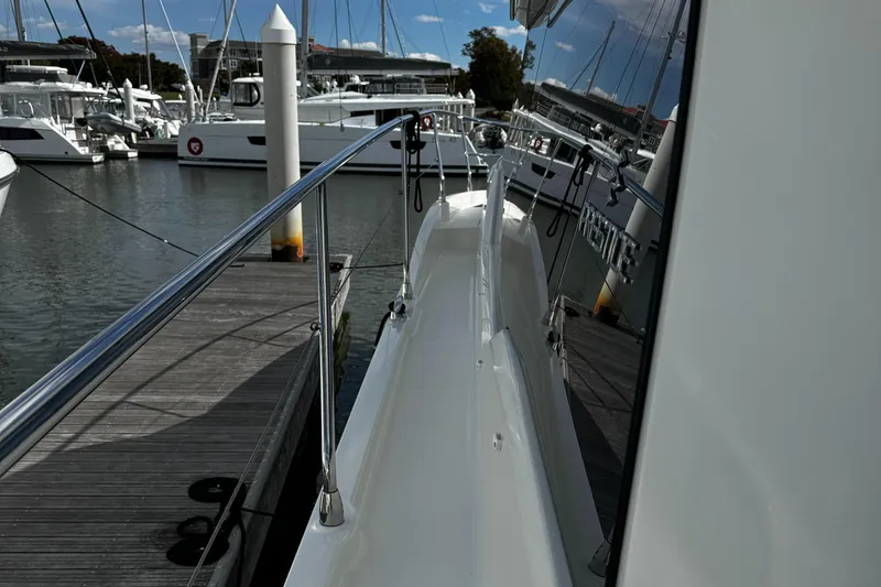 Slide: The Image of Side view of 2019 Prestige 460 Fly Bridge yacht docked at marina. - 8