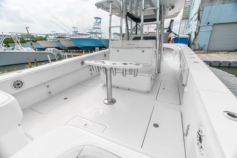 Slide: The Image of 2017 SeaHunter 39 Tournament boat with spacious deck and fishing rod holders. - 4