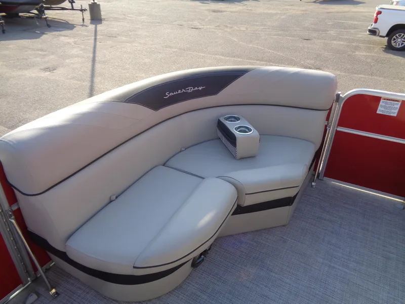 Slide: The Image of 2022 South Bay 222RS pontoon boat seating with cup holders, gray upholstery. - 17