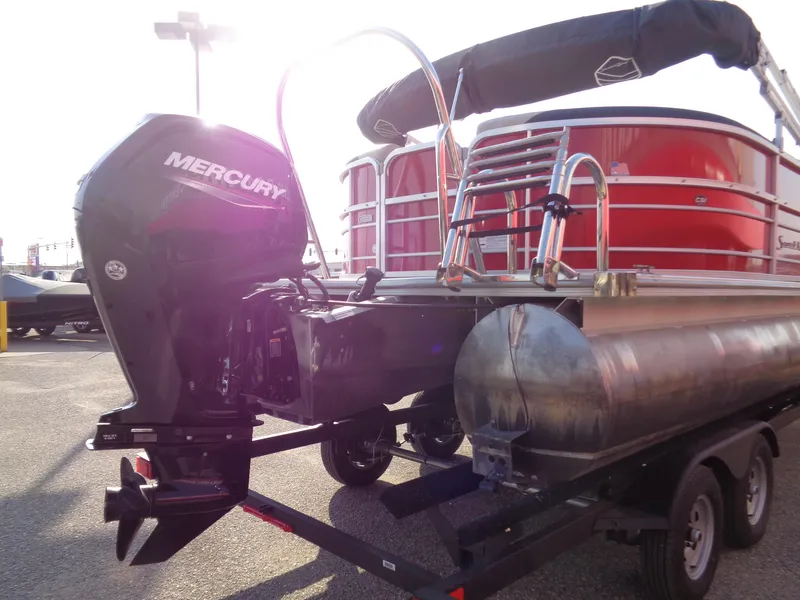 Slide: The Image of 2022 South Bay 222RS pontoon boat with Mercury outboard motor on trailer. - 4