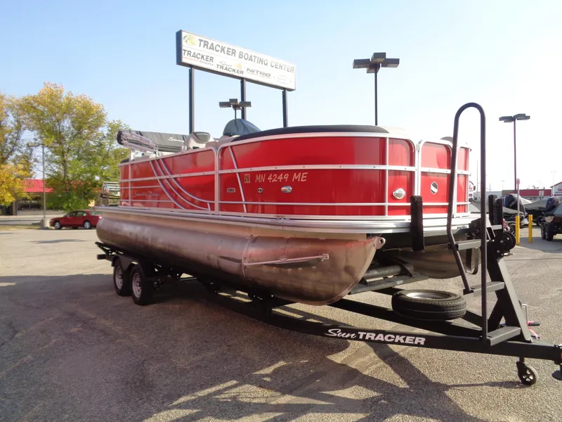 Slide: The Image of Red 2022 South Bay 222RS pontoon boat on trailer at Tracker Boating Center. - 6
