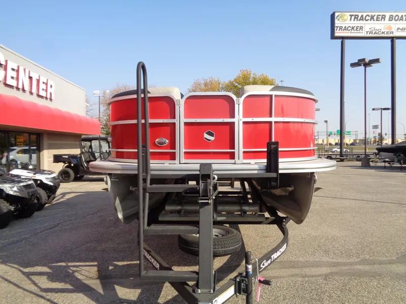 Slide: The Image of 2022 South Bay 222RS pontoon boat on trailer at dealership. - 7