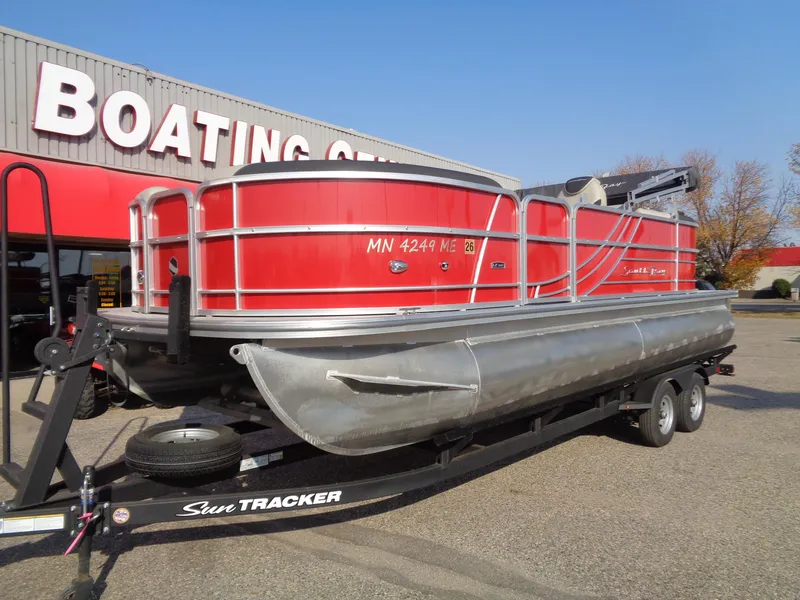 Slide: The Image of Red 2022 South Bay 222RS pontoon boat on trailer at boating center. - 8