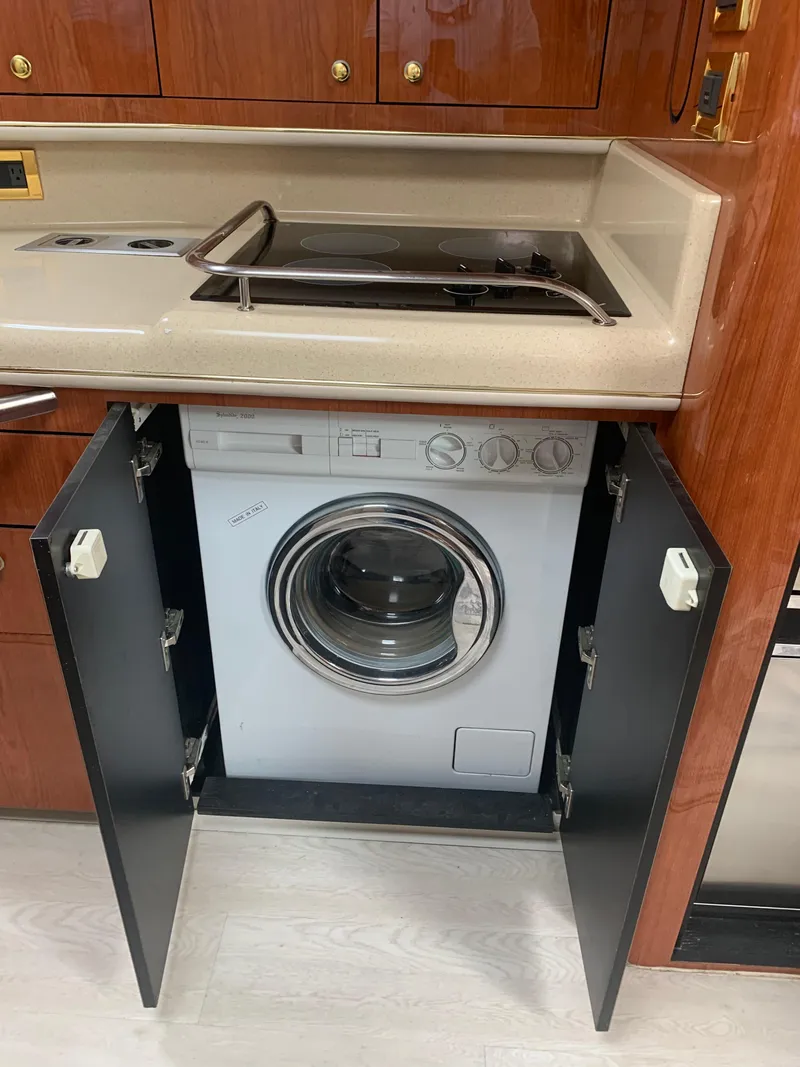 Slide: The Image of Washing machine in 1998 Sea Ray 450 Sundancer yacht kitchen cabinet. - 16