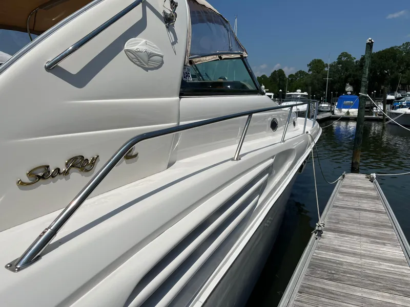 Slide: The Image of 1998 Sea Ray 450 Sundancer yacht docked at marina. - 9