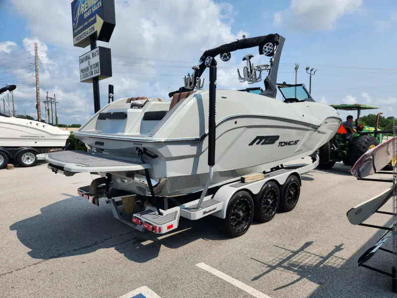 Slide: The Image of 2020 MB F24 Tomcat boat on trailer in parking lot, sunny day. - 4