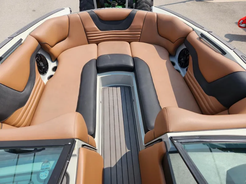 Slide: The Image of Luxurious interior of 2020 MB F24 Tomcat boat with tan and black seating. - 6