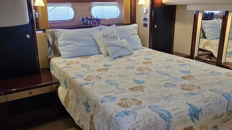 Slide: The Image of Luxurious bedroom interior of 2007 Sea Ray 580 Sedan Bridge yacht. - 6