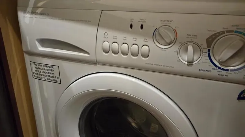 Slide: The Image of Washing machine control panel inside 2007 Sea Ray 580 Sedan Bridge yacht. - 7