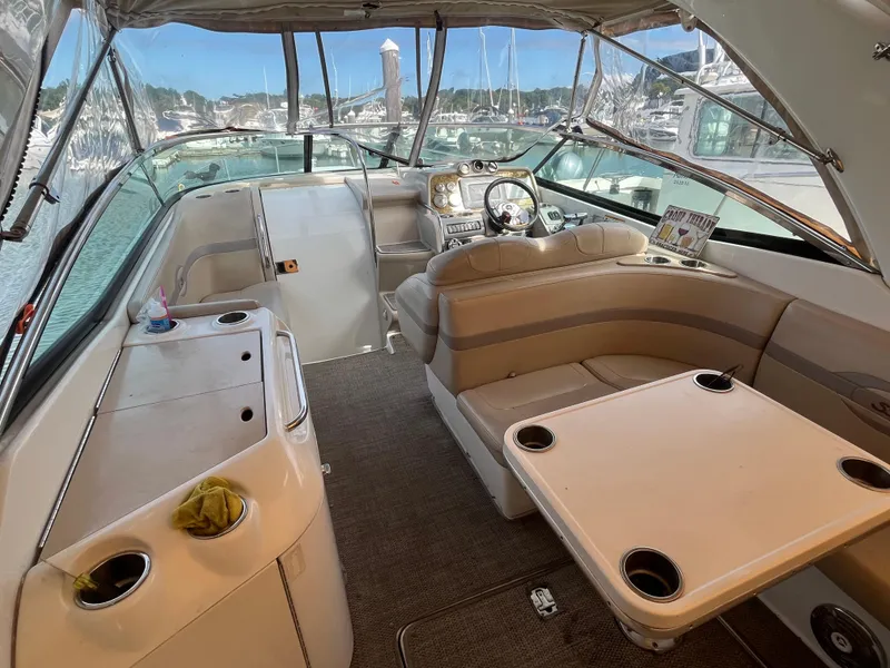 Slide: The Image of Interior of 2011 Formula 310 Sun Sport boat with seating and helm. - 5