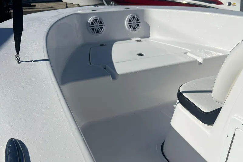 Slide: The Image of 2025 Tidewater 180 CC Adventure boat interior with seating and speakers. - 11