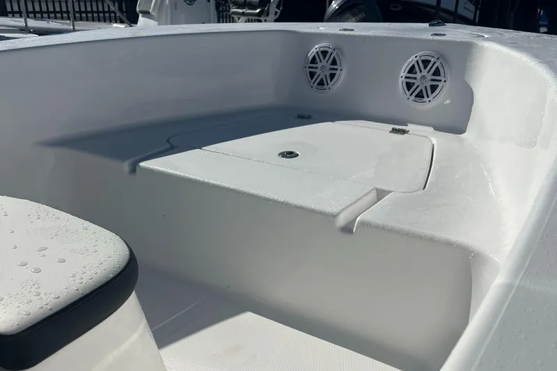 Slide: The Image of 2025 Tidewater 180 CC Adventure boat interior with seating and storage. - 7
