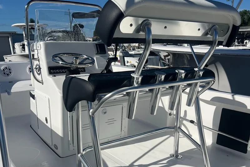 Slide: The Image of 2025 Tidewater 180 CC Adventure boat interior with console and seating. - 8