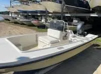 Slide: The Image of 1970 Mako 17 CC boat in storage, side view. - 8