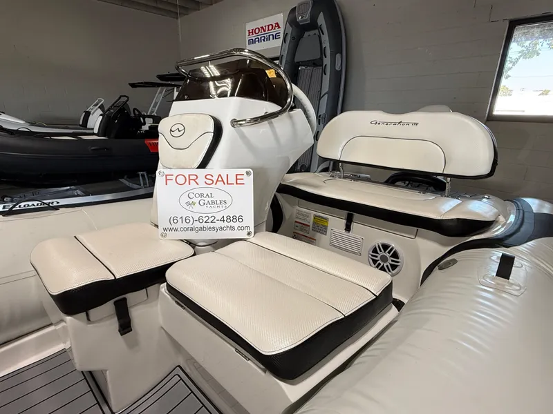 Slide: The Image of Walker Bay Generation 13 LTE 2025 boat interior, white seating, for sale sign displayed. - 5