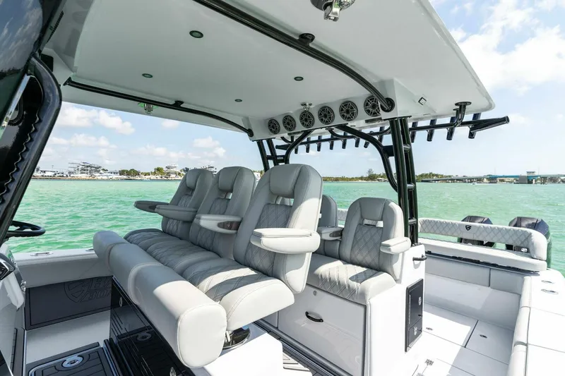 Slide: The Image of 2023 Barker Boatworks 40 High Performance Cat interior with luxurious seating and ocean view. - 22