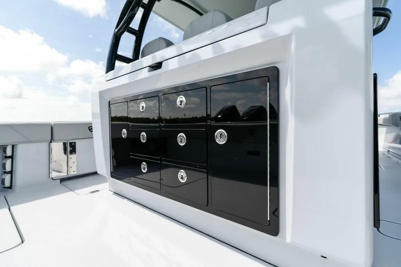 Slide: The Image of 2023 Barker Boatworks 40 High Performance Cat, sleek storage compartments on deck. - 39