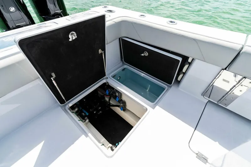 Slide: The Image of 2023 Barker Boatworks 40 High Performance Cat, open storage compartments on deck. - 40