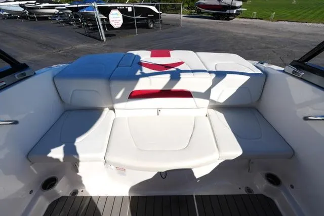 Slide: The Image of 2016 Chaparral H20 19 boat interior with white and red seating. - 12