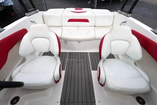 Slide: The Image of 2016 Chaparral H20 19 boat interior with white and red seating. - 30