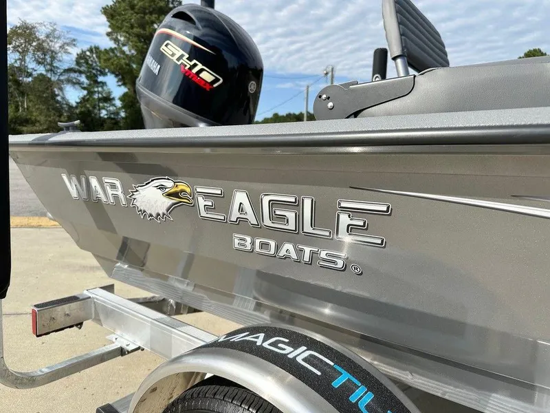 Slide: The Image of 2025 War Eagle Blackhawk 961 boat with Yamaha motor on trailer. - 10